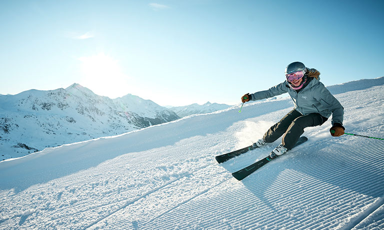 a skier going down a slope