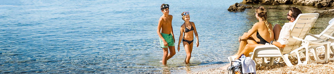 a group of people on a beach